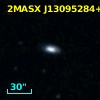 2MASX J13095284+2416030