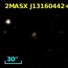 2MASX J13160442+2215433