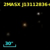2MASX J13112836+2203236