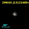 2MASX J13121689+2123596