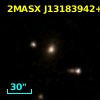 2MASX J13183942+2111002