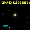 2MASX J13095831+2022216