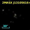 2MASX J13105616+2049222