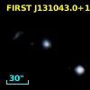 2MASX J13104302+1711550