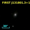 2MASX J13180127+1444101
