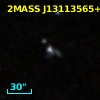 2MASX J13113562+1424472