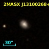 2MASX J13100268+1127063