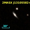 2MASX J13105582+1152297