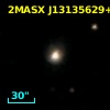 2MASX J13135629+1226015