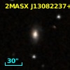 2MASX J13082237+0918544