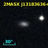 2MASX J13183636+0800039