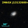 2MASX J13132600+0858565