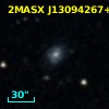 2MASX J13094267+0613013