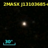 2MASX J13103685+0748465