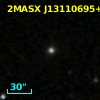2MASX J13110695+0338228