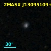2MASX J13095109+0318335