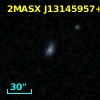 2MASX J13145957+0320355