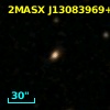 2MASX J13083969+0006085