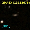 2MASX J13153676+0000539