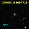 2MASX J13094715-0329518