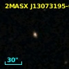 2MASX J13073195-0356537