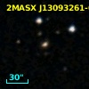 2MASX J13093261-0335329