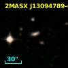 2MASX J13094789-0305118