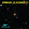 2MASX J13104017-0359342