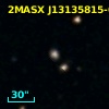 2MASX J13135815-0346320