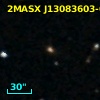 2MASX J13083603-0557208