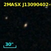2MASX J13090402-0558362