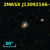 2MASX J13092166-0641120