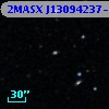 2MASX J13094237-0558342
