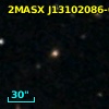 2MASX J13102086-0604394