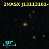 2MASX J13113161-0546050