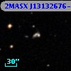 2MASX J13132676-0556450