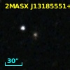 2MASX J13185551+3618257