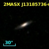 2MASX J13185736+2938473
