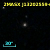 2MASX J13202559+2436590