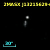 2MASX J13215629+2411465