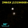 2MASX J13194668+2200370