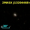 2MASX J13204468+2217591