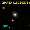 2MASX J13220373+2216099