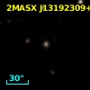 2MASX J13192309+2116454