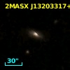 2MASX J13203317+2104135