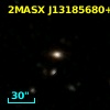 2MASX J13185680+2115442