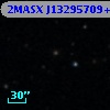 2MASX J13295709+1820591