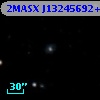 2MASX J13245692+1614082