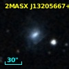 2MASX J13205667+1409217