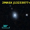 2MASX J13233077+1346228